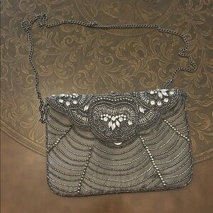Charming Charlie Black and Silver Beaded Clutch